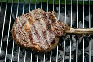 Tomahawk steak with herbs and spices photo