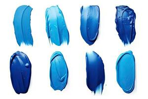 Set of blue lipstick or nail polish smears strokes isolated on white background photo