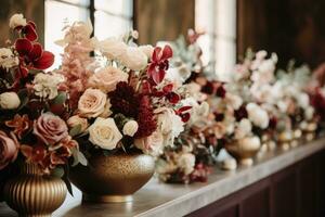 Organic Thanksgiving Floral Arrangements displayed in sophisticated tones of deep merlot red blush peach sage green and pearl white hues photo