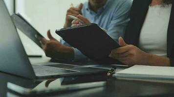 Business team collaboration discussing working analyzing with financial data and marketing growth report graph in team, presentation and brainstorming to strategy planning making profit of company. video