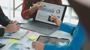 Business team collaboration discussing working analyzing with financial data and marketing growth report graph in team, presentation and brainstorming to strategy planning making profit of company. video