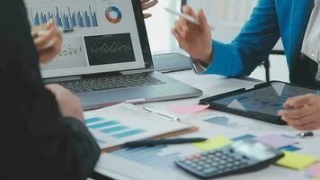 Business team collaboration discussing working analyzing with financial data and marketing growth report graph in team, presentation and brainstorming to strategy planning making profit of company. video