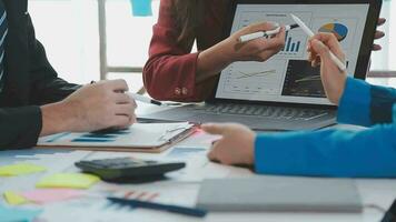 Business team collaboration discussing working analyzing with financial data and marketing growth report graph in team, presentation and brainstorming to strategy planning making profit of company. video