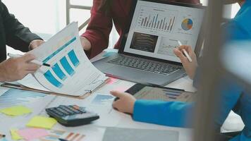 Business team collaboration discussing working analyzing with financial data and marketing growth report graph in team, presentation and brainstorming to strategy planning making profit of company. video