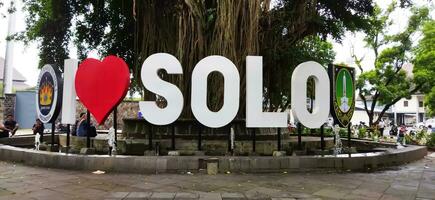 Solo, Central Java, Indonesia. March 05, 2023. Local people are visiting Sriwedari Park where the signage of I Love Solo located during morning day, they love to taking picture in this city landmark photo