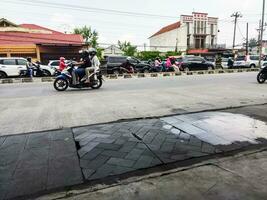 Karanganyar, Indonesia - April 24, 2023. Mudik or Pulang Kampung traffic congestion the traditions of Indonesian Muslims come to their hometowns from big cities to celebrate Eid or Lebaran photo