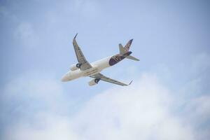 New Delhi, India, July 16 2023 - Vistara Airbus A320 neo take off from Indra Gandhi International Airport Delhi, Vistara domestic aeroplane flying in the blue sky during day time photo