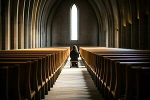 Adult reflecting solitude in church pews background with empty space for text photo