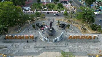 Gorontalo, Indonesia - September 07, 2023 - Aerial view of Nani Wartabone Monument at Taruna Remaja Square photo