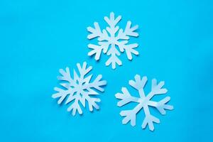 three snowflake particle paper cut photo