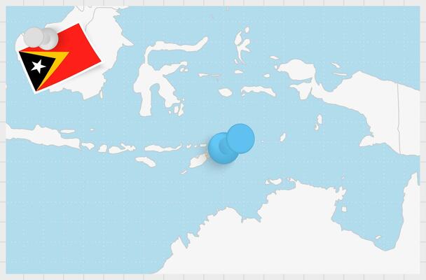Map of East Timor with a pinned blue pin. Pinned flag of East Timor.