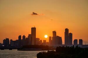 The night view of the city of Yeouido, a high-rise building, shot at Dongjak Bridge in Seoul at sunset photo