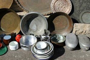 Old and antique items are sold at a flea market in Israel. photo