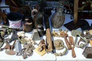 Old and antique items are sold at a flea market in Israel. photo