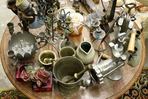 Old and antique items are sold at a flea market in Israel. photo