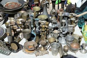 Old and antique items are sold at a flea market in Israel. photo