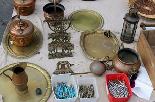 Old and antique items are sold at a flea market in Israel. photo