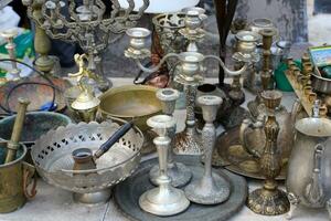 Old and antique items are sold at a flea market in Israel. photo