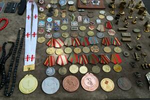 Old and antique items are sold at a flea market in Israel. photo