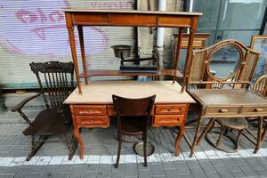 Old and antique items are sold at a flea market in Israel. photo