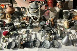 Old and antique items are sold at a flea market in Israel. photo