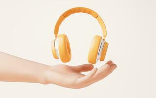 An orange earphone in a hand, 3d rendering. photo