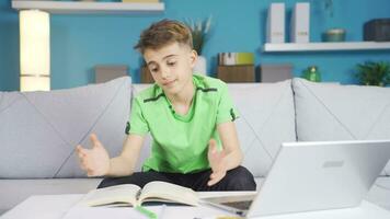 A child who is bored and distracted while reading. video