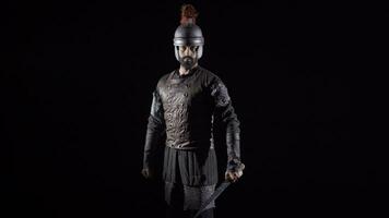 Ancient Roman knight. Black background. video