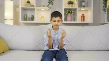 Boy praying, asking Gods well wishes. video