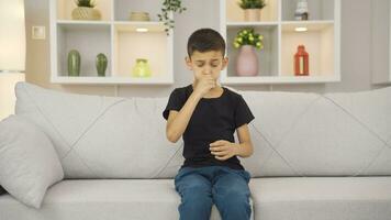 Sick boy coughing. video