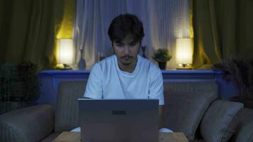 Man encountering problem on laptop. The man is angry and trying to figure it out. video