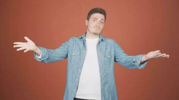 Man looking at camera with a negative expression. video