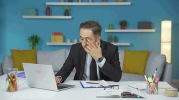 Home office worker man accidentally dips his glasses in his eye. Clumsy man. video