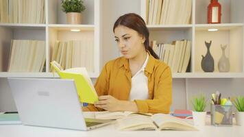 Books and unhappy Female student. video