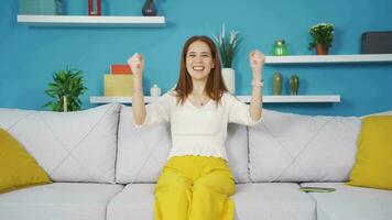 Young woman experiencing joy looking at camera. video