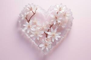 Ice Heart made of beautiful white sakura flowers on pink background, top view.AI Generated photo