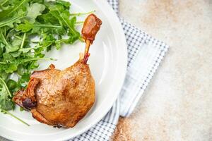 fresh duck leg confit berry sauce poultry meat eating cooking appetizer meal food snack on the table copy space food background rustic top view photo