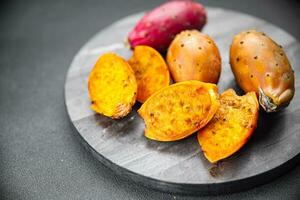 prickly pear exotic fresh fruit figues de barbarie tasty appetizer meal food snack on the table photo