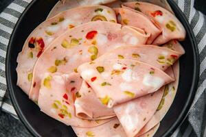 sausage mortadella piece marinated vegetable boiled olive, pickled cucumber, pepper, gherkin eating appetizer meal food snack on the table copy space food background rustic top view photo