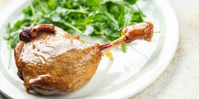 duck leg confit berry sauce poultry meat eating cooking meal food snack on the table copy space food background rustic top view photo