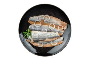 herring fresh salted fish tasty seafood healthy eating cooking appetizer meal food snack Pescetarian diet on the table copy space photo