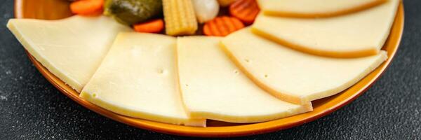 raclette cheese meal vegetable eating cooking meal food snack on the table copy space food background rustic top view photo
