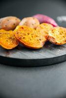 prickly pear exotic fresh fruit figues de barbarie tasty appetizer meal food snack on the table photo