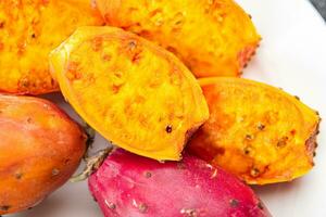 prickly pear exotic fresh fruit figues de barbarie tasty appetizer meal food snack on the table photo