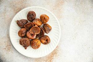 dried figs fruit eating cooking meal food snack on the table copy space food background rustic top view photo