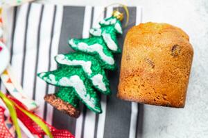 Panettone Navidad horneando dulce Pastelería dulce postre fiesta tratar nuevo año y Navidad celebracion comida comida bocadillo en el mesa Copiar espacio foto