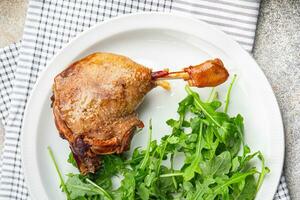 duck leg confit berry sauce poultry meat eating cooking meal food snack on the table copy space food background rustic top view photo