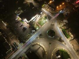 High Angle View of Luton City of England During Night. Drone's Camera footage Was Captured on Early Night on October 12th, 2023 photo