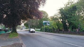 Low Angle View of British Town and Road during Sunset on May, 19th, 2023. Luton, England, UK photo