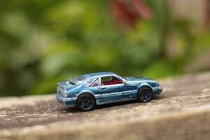 MAGELANG,INDONESIA.12 05 2023.photo of a car race toy car with a blurred background. photo